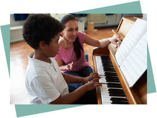 piano teacher and piano student having music lessons in toronto